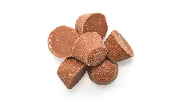 Yupik mini cups revealing creamy peanut butter filling, a tempting snack.