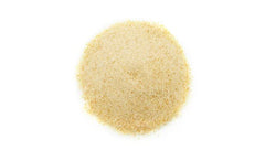Yupik Organic Ground Date Powder sprinkled on yogurt for flavor