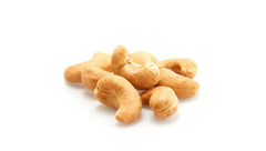 Yupik dry roasted cashews pour; perfect topping for yogurt or salads.