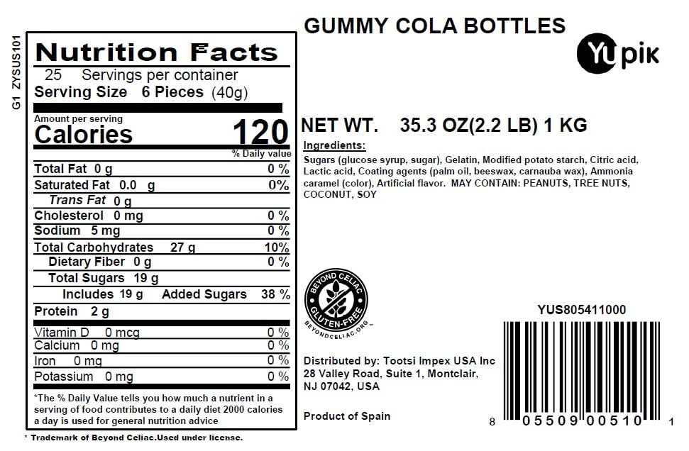 Yupik Gummy Cola Bottles close-up shows soft, chewy texture