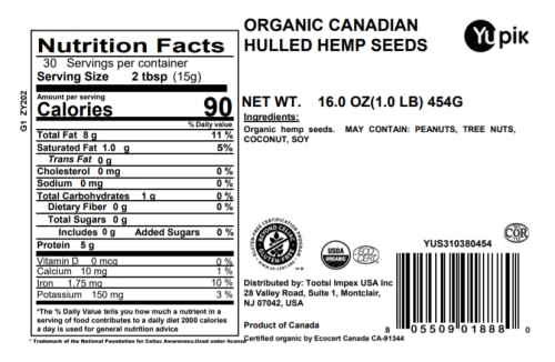 Yupik hulled hemp seeds closeup highlights creamy texture and quality.