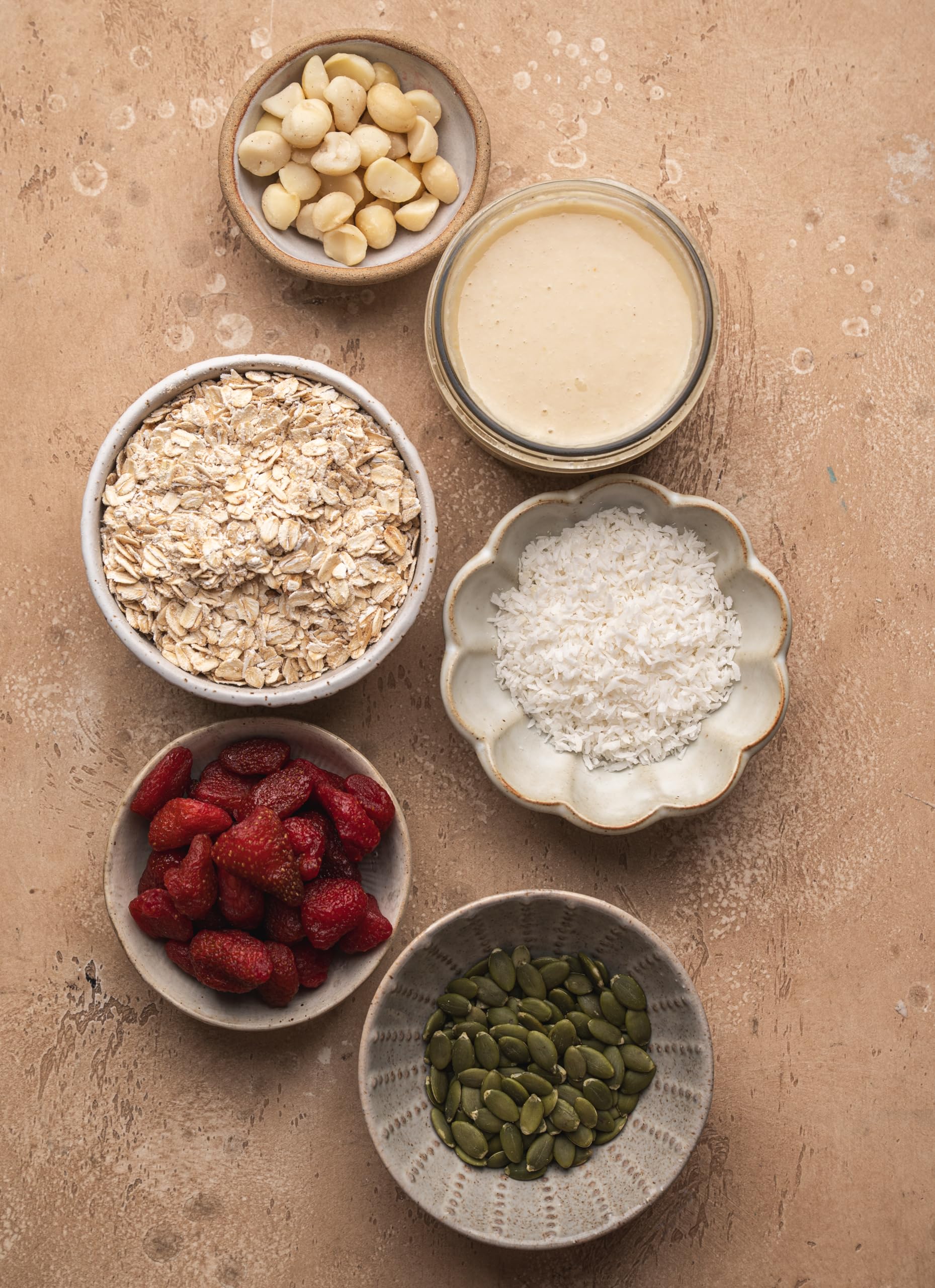 Macadamia toppings sprinkled over salad or yogurt for creamy crunch