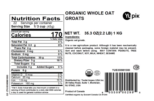 Close-up of Yupik hulled oat groats showing whole grain texture, great for porridge and baking