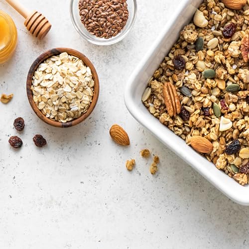 Yupik oats granola clusters baked on a tray for crunch.