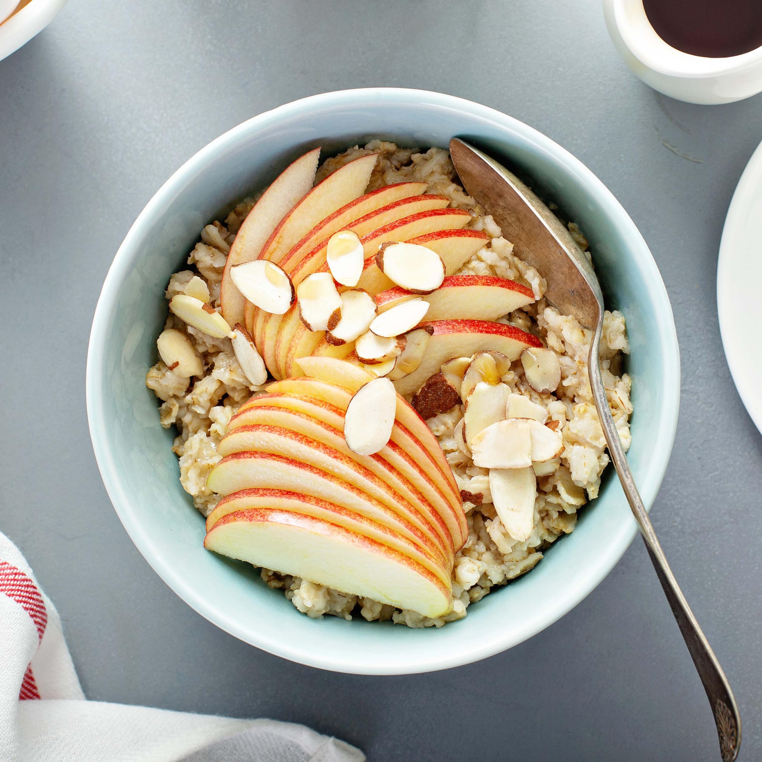 Yupik oats porridge preparation with measuring cups for a simple start.