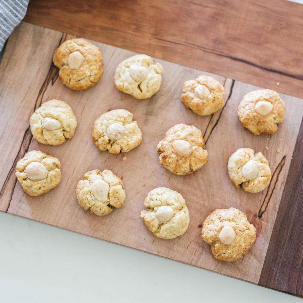 Yupik Organic Almond Meal displayed with measuring scoop for easy baking prep.