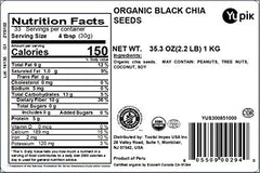 Yupik Organic Black Chia Seeds measured with a spoon for recipes