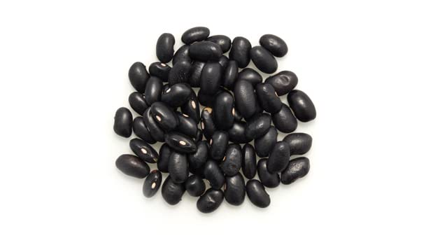Yupik organic black turtle beans soaked in water preparing for cooking