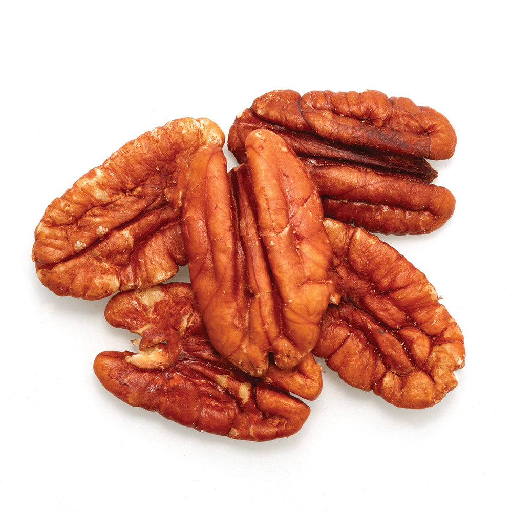 Close-up of Yupik pecans highlighting rich texture ideal for baking or topping yogurt.