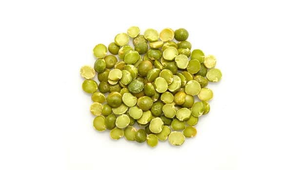Yupik Organic Split Green Peas cooking in pot to tender texture.