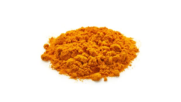 Yupik Organic Turmeric Powder in a smoothie glass for bright flavor