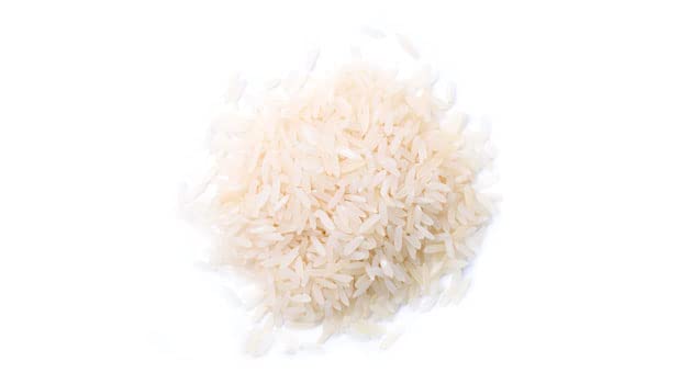 Yupik organic white rice long grain cooking in pot for easy prep.