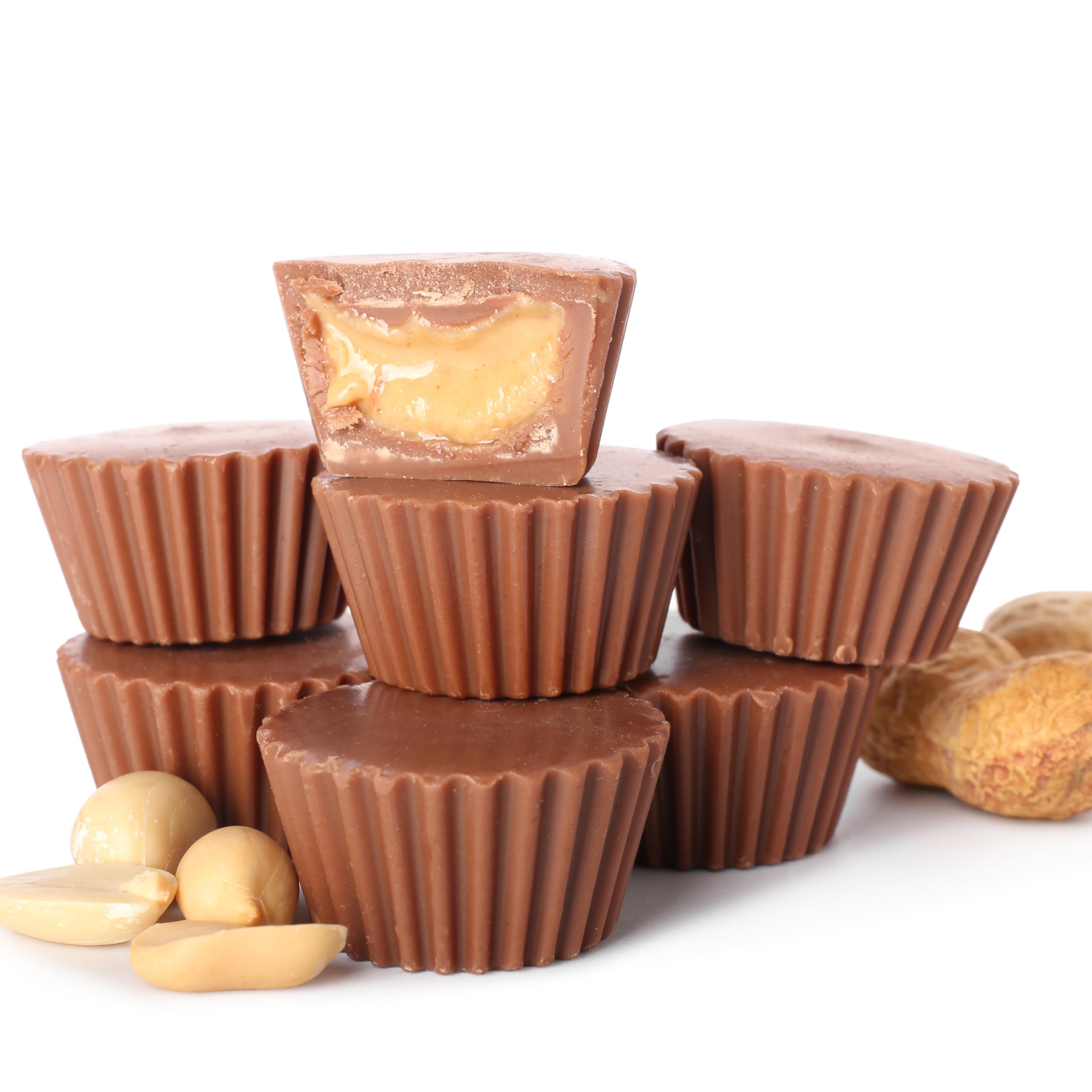 Yupik peanut butter cups stacked in a gift box.