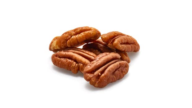 Yupik pecans halves, shelled and halved for recipes