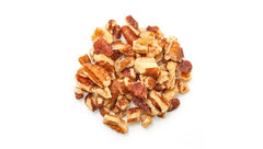 Yupik pecans on a baking tray, ready for cookies and desserts.