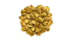 Yupik pumpkin seeds sprinkled on yogurt for a tasty, protein-rich topping.