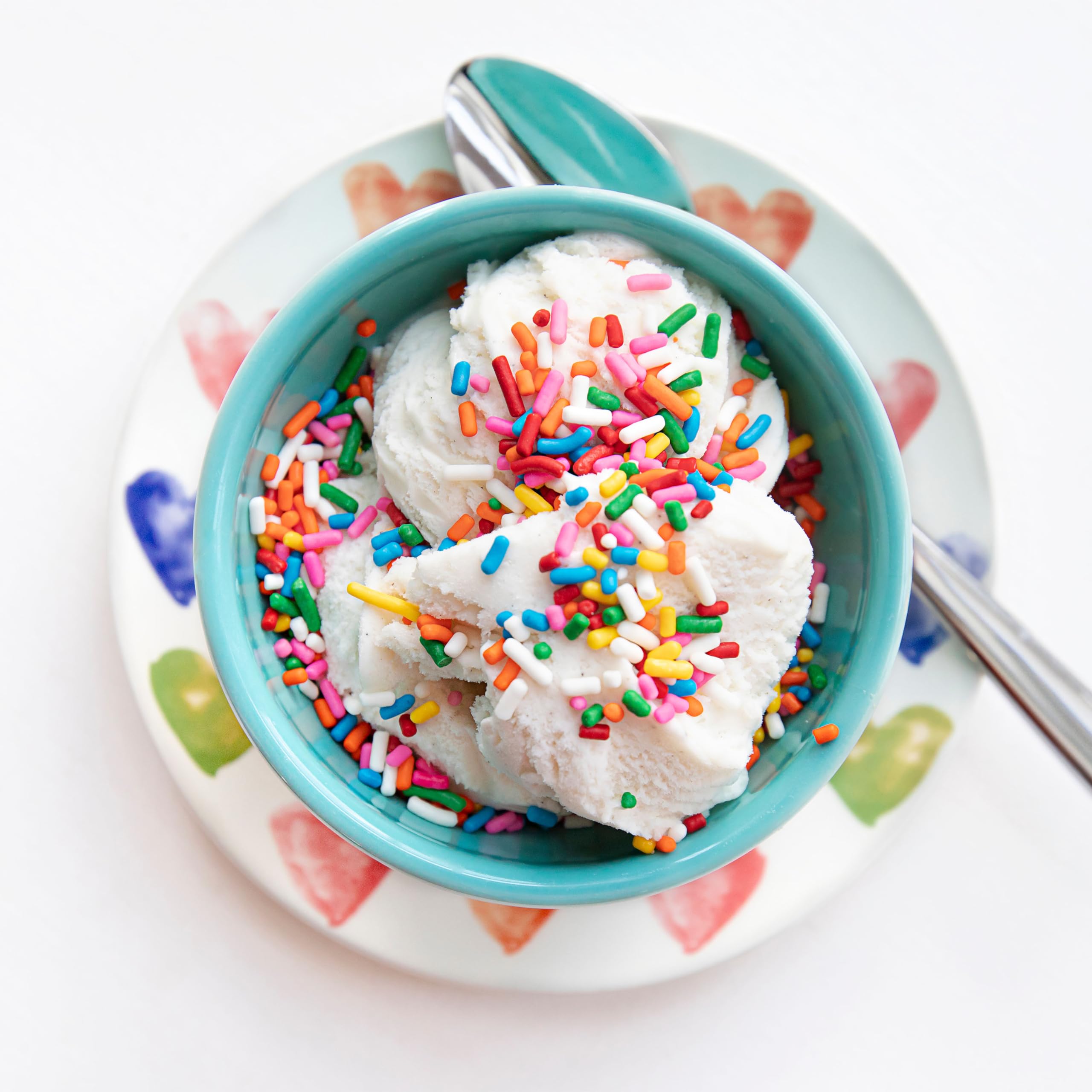 Yupik Rainbow Sprinkles storage bottle shown with vibrant colors.