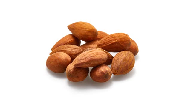 Almonds being poured, easy portioning with Yupik packaging
