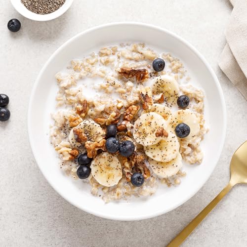 Yupik oats in a warm cereal bowl with milk, cozy morning scene.