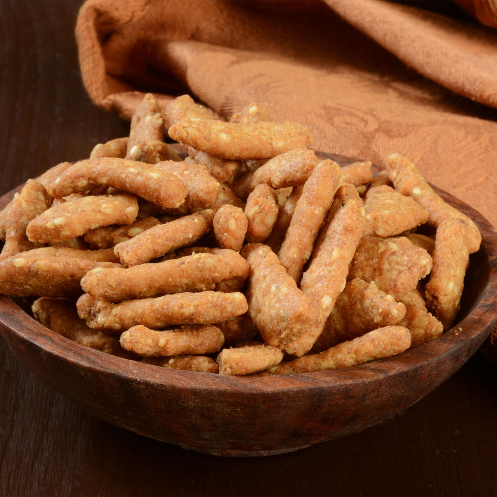 Yupik salted sesame sticks bag open reveals airy snack inside