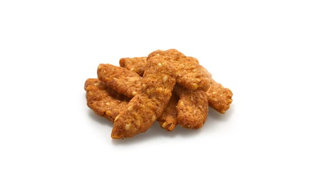 Yupik salted sesame sticks on a snack plate evoke party-ready pairing