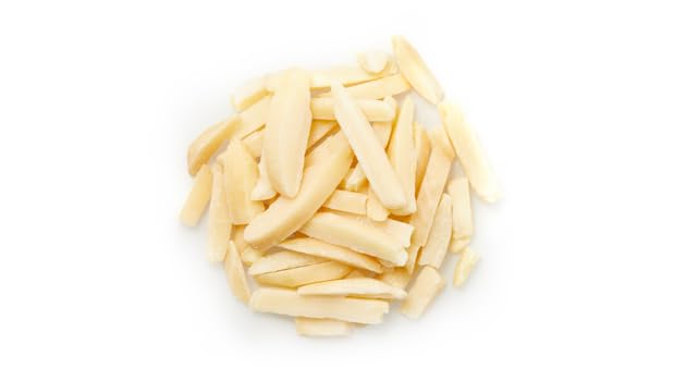 Yupik slivered California almonds closeup texture highlights creamy, crunchy bite for recipes.