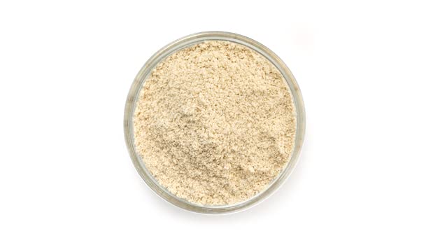 Yupik Sorghum Flour used in dough, versatile for gluten-free baking.