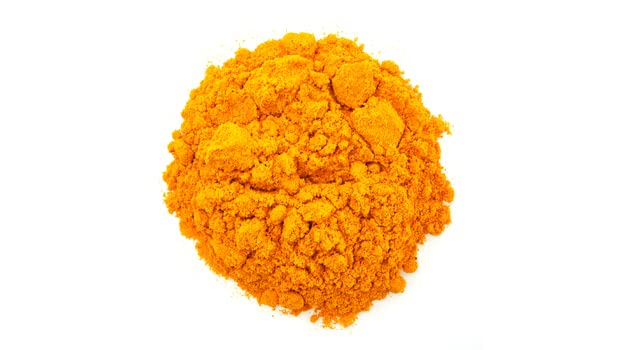 Yupik Turmeric Powder scoop showing convenient measuring and versatile usage