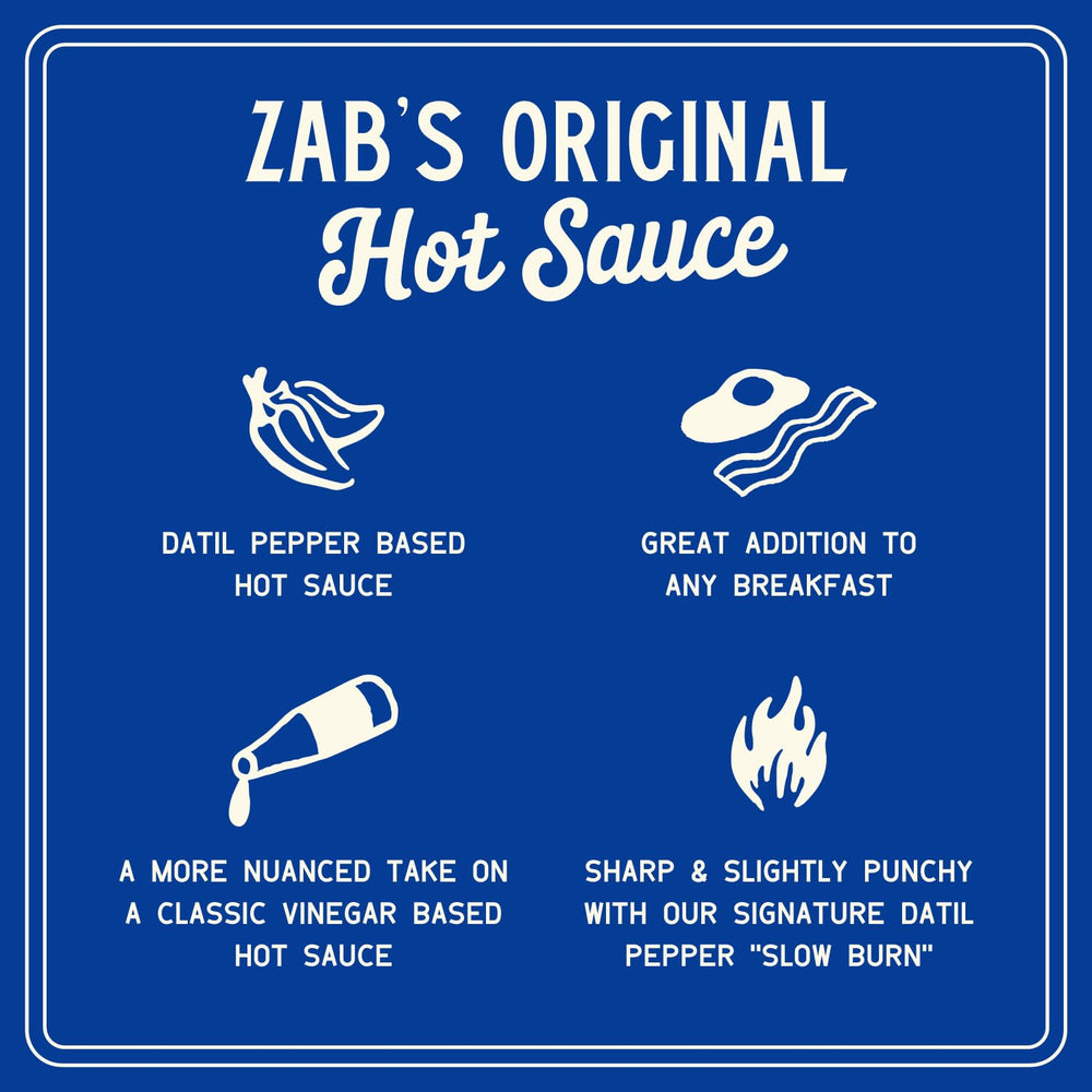 Zab's hot sauce pour captures a smooth flow and balanced heat.