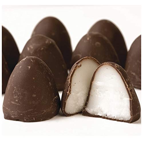 Close-up of Zachary Vanilla Creme Drops with chocolate coating and vanilla center, ideal indulgence.