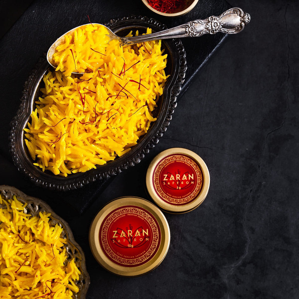 Paella dish showing saffron hue enhanced by Zaran Saffron.