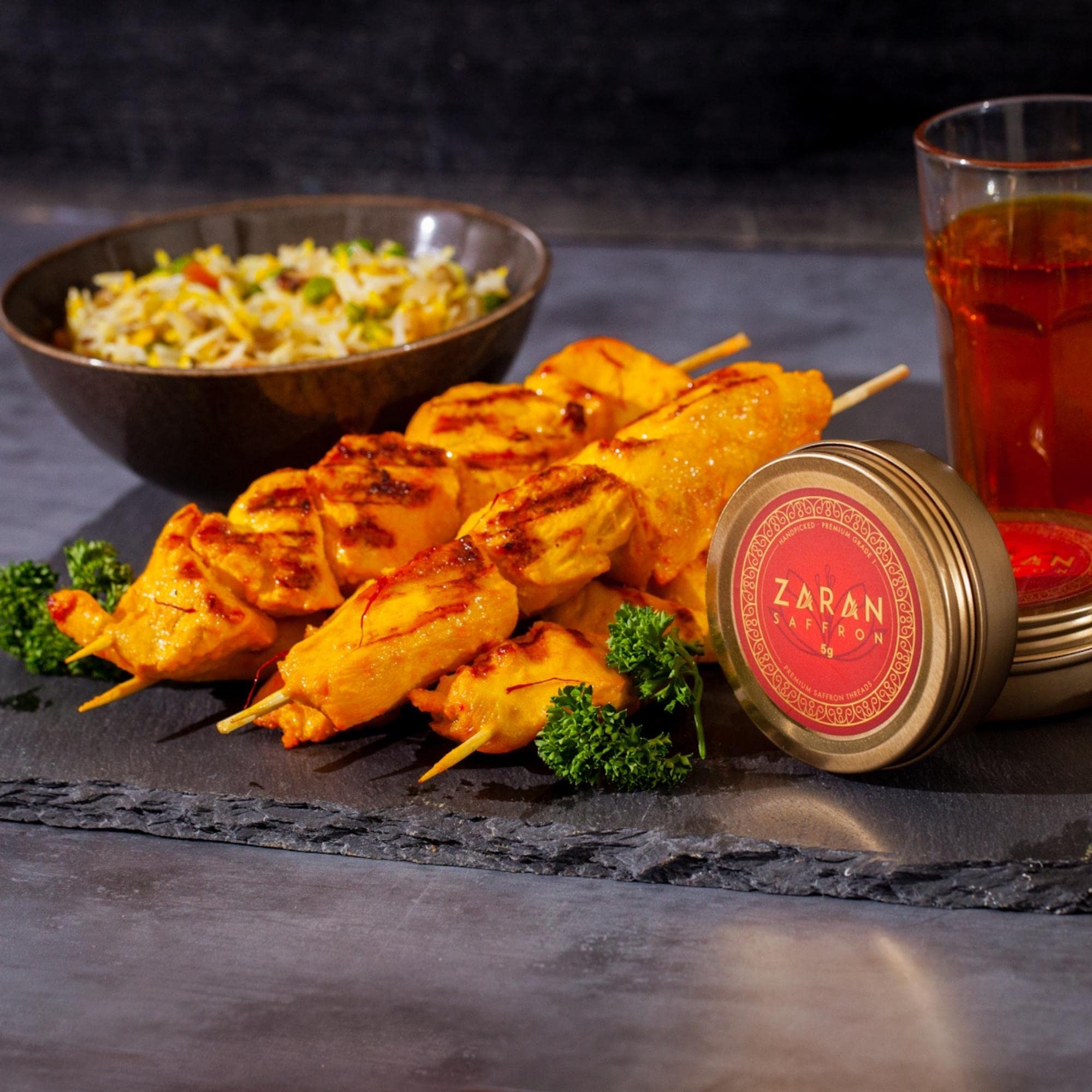 Zaran saffron paella golden hue enhances vibrant rice dishes.