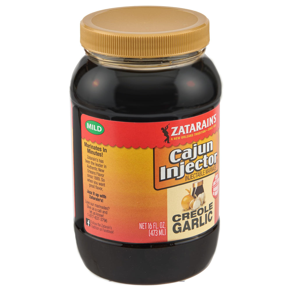 Zatarain's Cajun Injector Creole Garlic Marinade bottle ready for use.