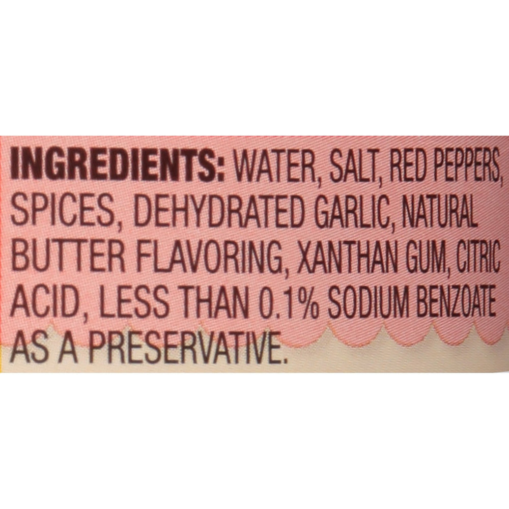 Zatarain's Creole butter marinade being poured for flavorful meat prep