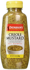 Zatarain's Creole Mustard bottle close-up for bold flavor on sandwiches.