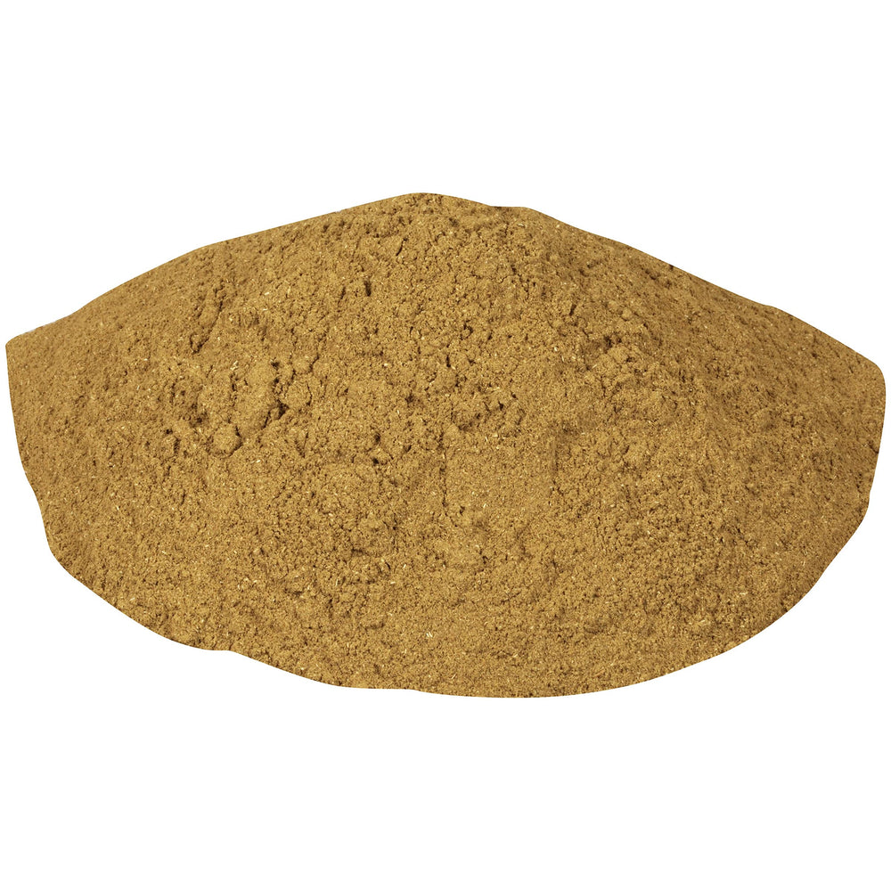 Filé powder sprinkled into a dish for depth and authenticity.
