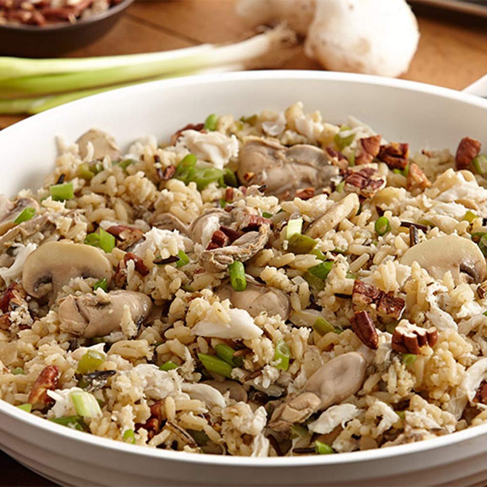 Zatarain's Long Grain & Wild Rice side-dish served beside vegetables and proteins.