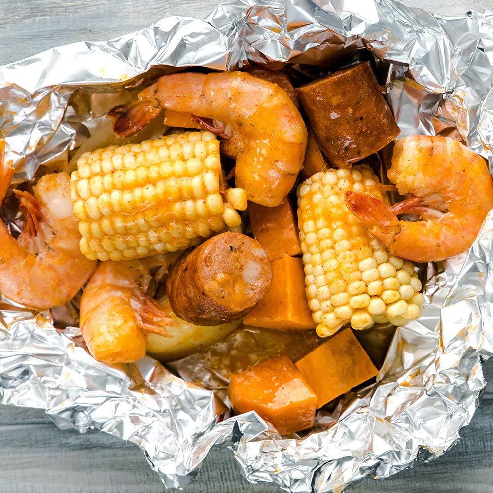 Seafood boil in pot with Zatarain's seasoning aroma.