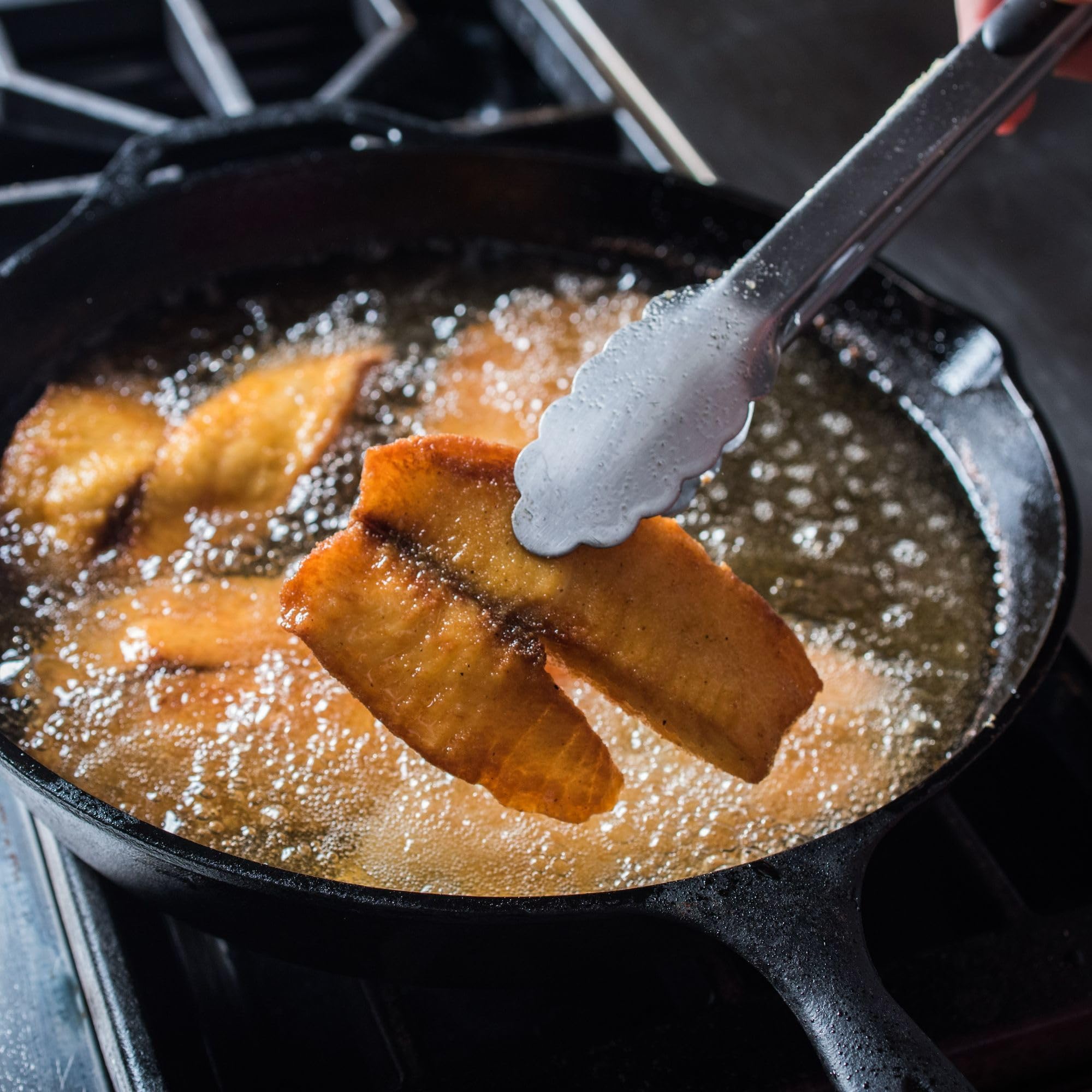 Deep-frying with Zatarain's Fish Fri for a crisp finish.