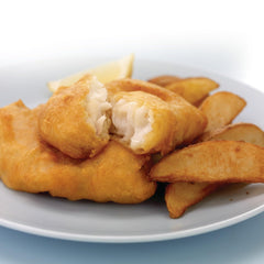Coated fish sizzling in oil after applying Zatarain's Fish Fri.