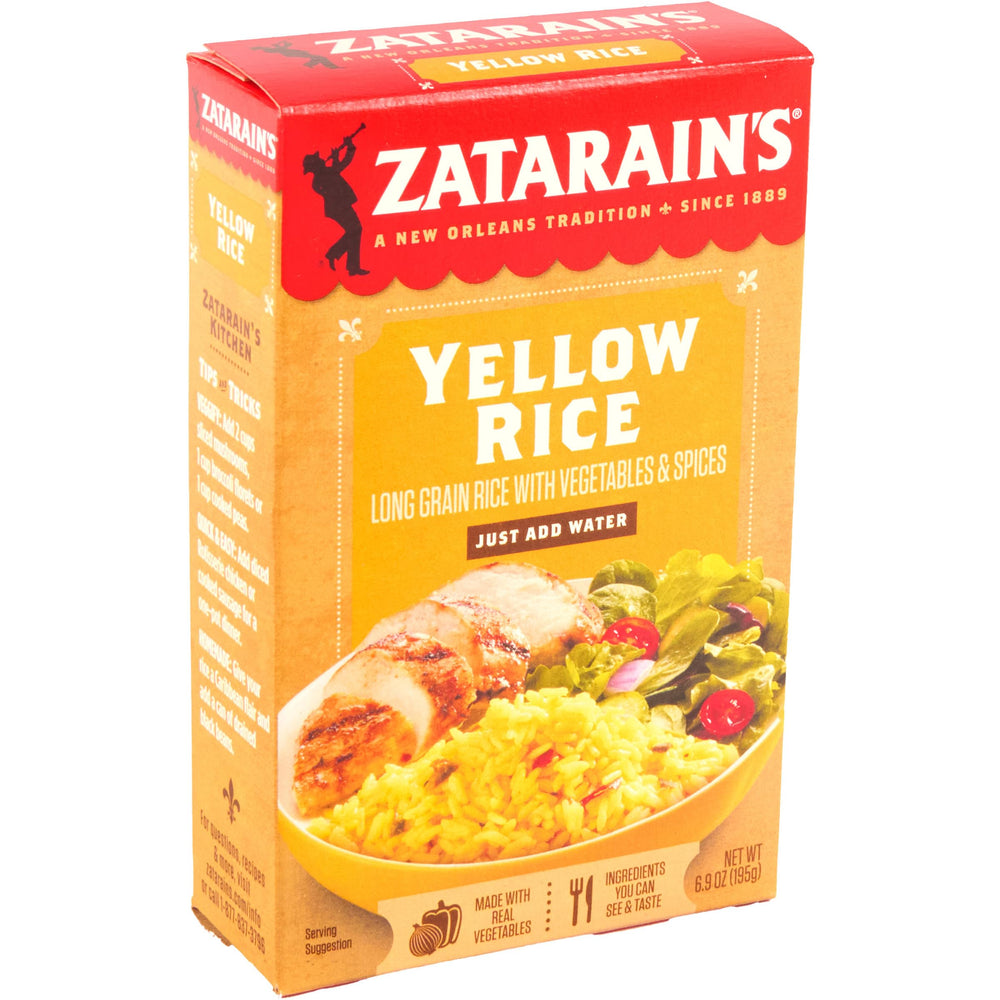 Close-up of turmeric, onion, and pepper ingredients in Zatarain's Yellow Rice.