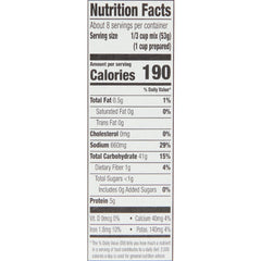 Zatarain's Yellow Rice steaming from a pot, fluffy grains ideal for quick dinners.