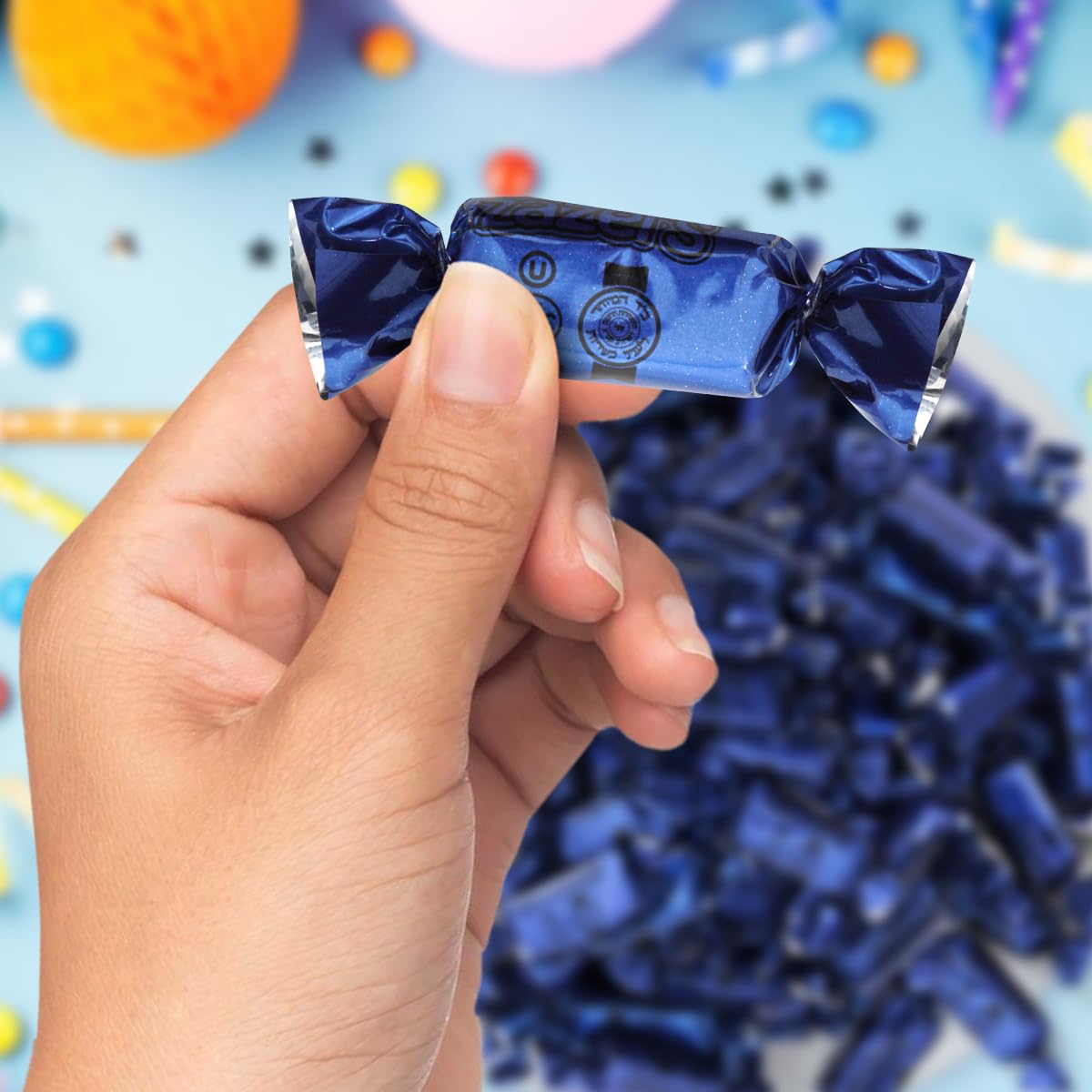 Blue foil candy on display adds playful flair to office receptions.