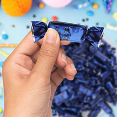 Blue foil candy on display adds playful flair to office receptions.