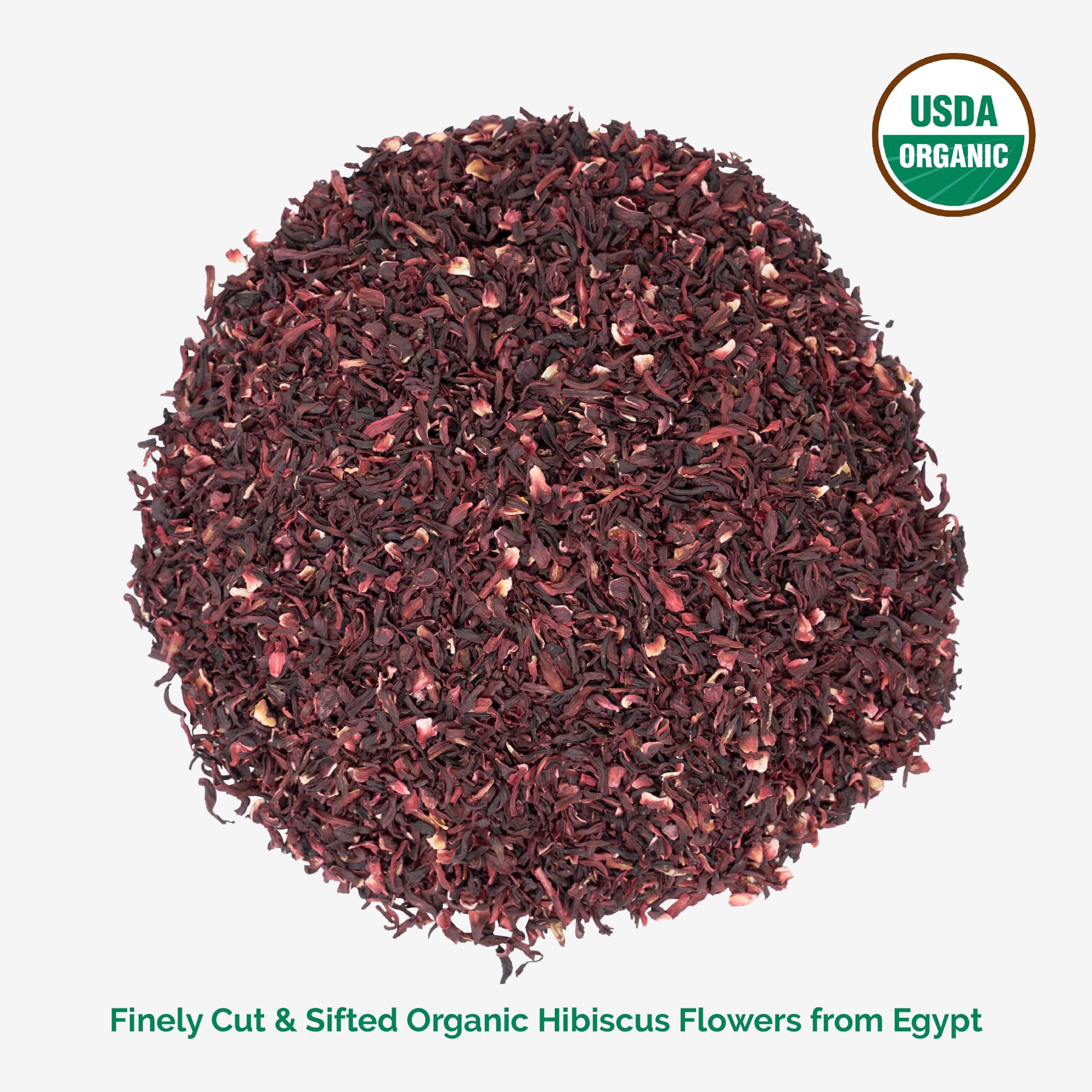 Zeeza hibiscus tea brew in a glass, rich red infusion for cooling drinks