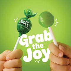Green sour apple lollipops in bulk bag displayed for event planning