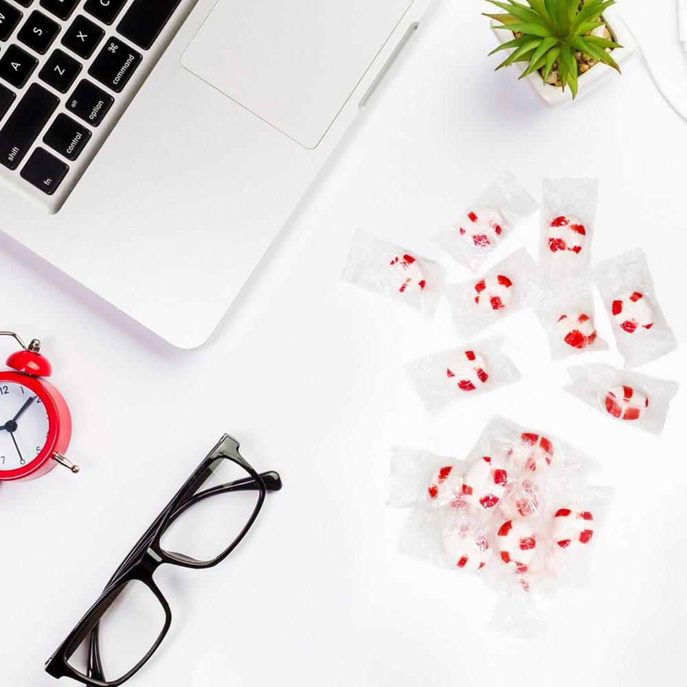 Zisbers Soft Peppermint Puffs on an office desk, ready for a quick breath refresh