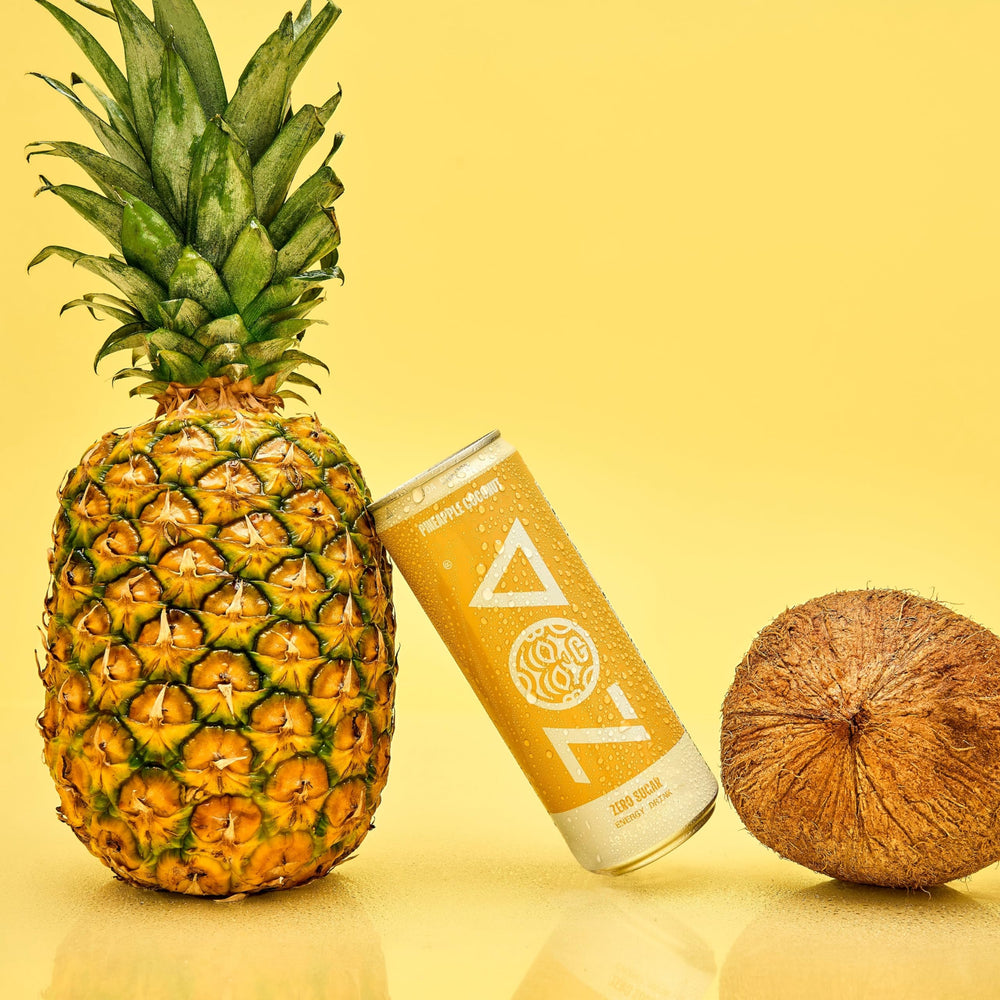 ZOA Pineapple Coconut bottle closeup features natural caffeine from green tea.