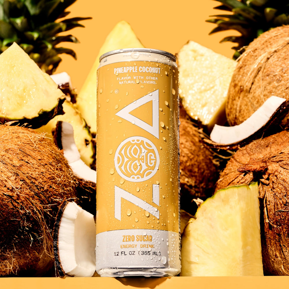 ZOA Pineapple Coconut pouring into a glass for immediate hydration.