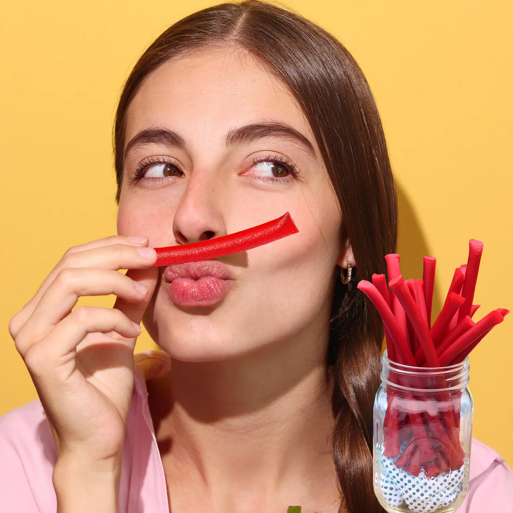 Holiday gift idea with RedVinnes licorice ropes in festive packaging.
